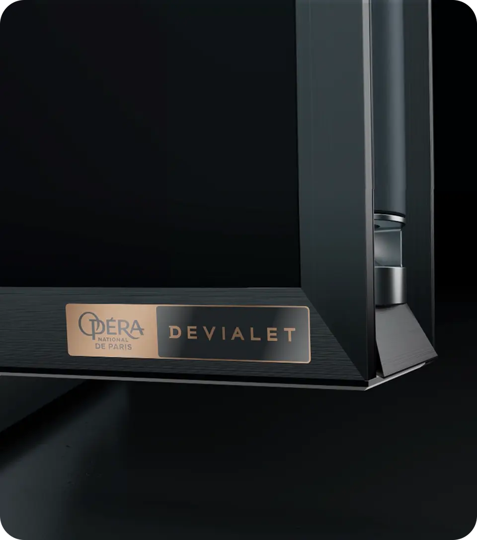 Close-up of the Hisense 116UX Devialet audio badge